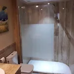 4 Palmeras *